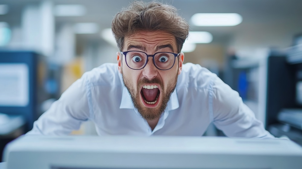 employee annoyed by broken copier